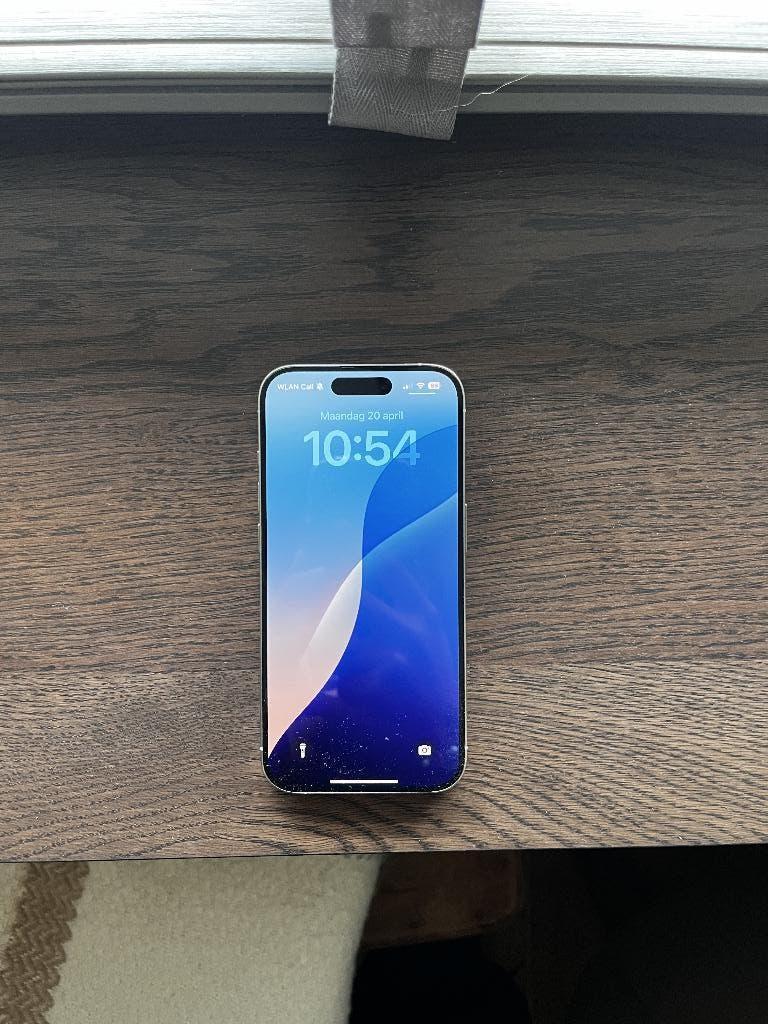 iPhone 15 pro Titanium white 128 GB, Telecommunicatie, Mobiele telefoons | Apple iPhone, 128 GB, Wit, Ophalen of Verzenden, Zo goed als nieuw