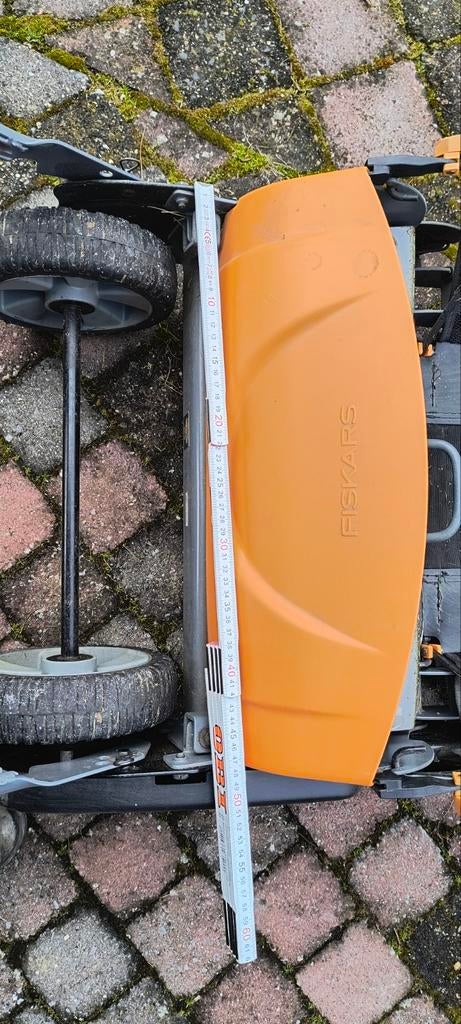 Fiskars kooimaaier met opvangbak, Ophalen