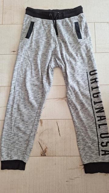 Één keer gedragen grijze  joggingbroek, maat 164cm, merk H&M beschikbaar voor biedingen
