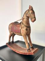 Antiek houten paard, Ophalen