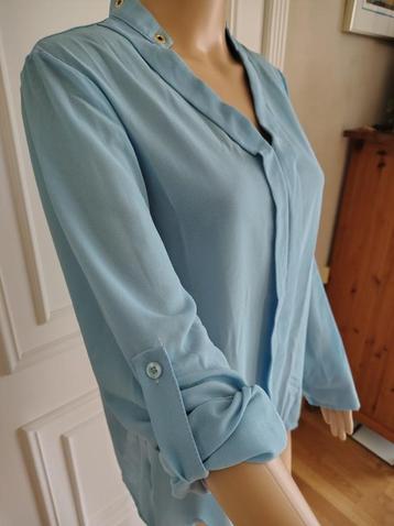 blauwe nette blouse   beschikbaar voor biedingen