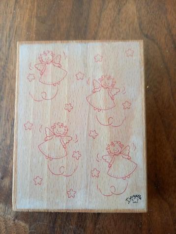 Kerststempel met engeltjes beschikbaar voor biedingen