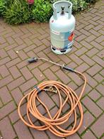 Gasfles met gasbrander, Ophalen, Gebruikt