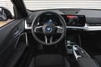 BMW iX1 eDrive20 M Sport / Trekhaak / Sportstoelen / Achteru, Auto's, BMW, Zwart, Zwart, SUV of Terreinwagen, 1840 kg