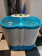 Kleine wasmachine, Ophalen