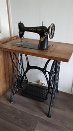 Slinger naaimachine, Ophalen