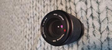 Voor de liefhebber. Tokina 70-210 mm lens met macro. beschikbaar voor biedingen