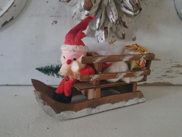 Antiek kerstman op slee  beschikbaar voor biedingen