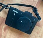 Nikon1 V1 body+10-30mm 30-110mm tassen statieven IZGST, Ophalen of Verzenden, Zo goed als nieuw, Nikon, 8 keer of meer