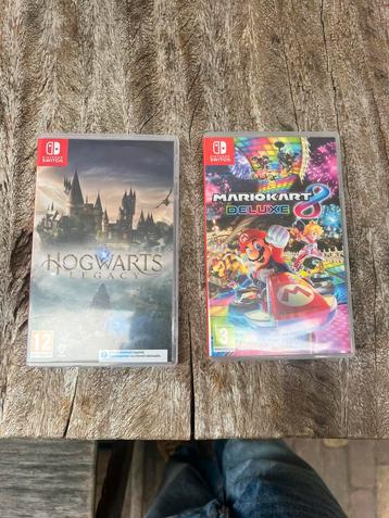 Nintendo Switch spellen Mario cart de luxe en Hogwarts beschikbaar voor biedingen