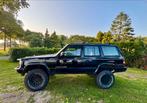 Jeep Cherokee 4.0 I 5DRS AUT 1997 Zwart, Auto's, Jeep, Automaat, Leder en Stof, Zwart, Vierwielaandrijving