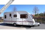 Swift Charisma 555 + voortent en luifel, zitgroep voorin, Caravans en Kamperen, Caravans, Overige typen, Rondzit, Schokbreker