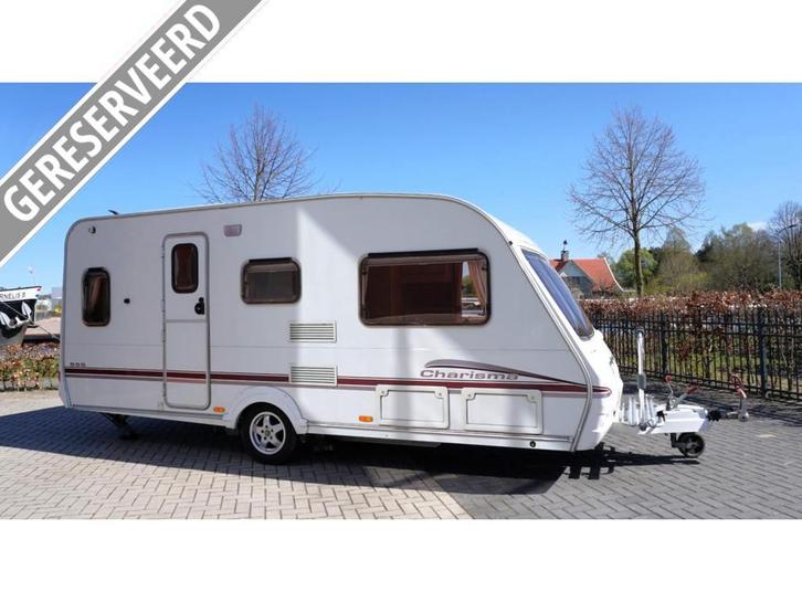 Swift Charisma 555 + voortent en luifel, zitgroep voorin, Caravans en Kamperen, Caravans, Bedrijf, tot en met 4, 1000 - 1250 kg