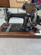 Oude naaimachine, Ophalen