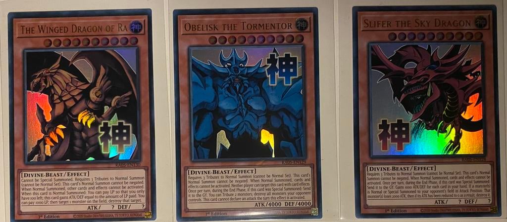 Yu-Gi-Oh! Stamped Egyptian God Set RA05 1st Edition English, Hobby en Vrije tijd, Verzamelkaartspellen | Yu-gi-Oh!, Ophalen of Verzenden