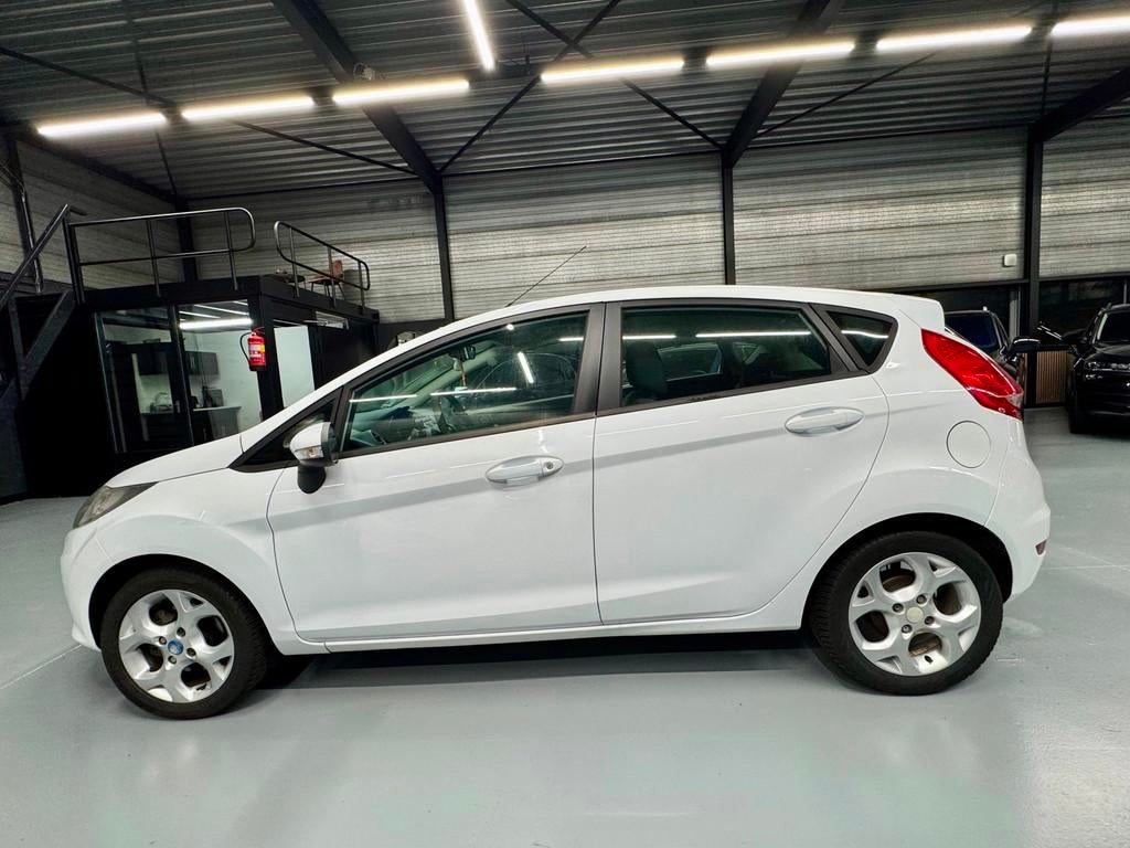 Ford Fiesta 1.25 Limited 5Drs Airco/Apk, Voorwielaandrijving, 1242 cc, 4 cilinders, 60 pk