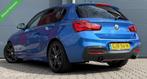 BMW 1-serie M140i xDrive LCI2 Edition Shadow Executive Navi+, Auto's, Gebruikt, Euro 6, Blauw, 340 pk