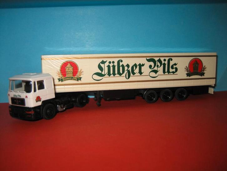 Lubzer-Pils   MAN  met oplegger  spec.prijs  Herpa, Hobby en Vrije tijd, Modelauto's | 1:87, Zo goed als nieuw, Bus of Vrachtwagen