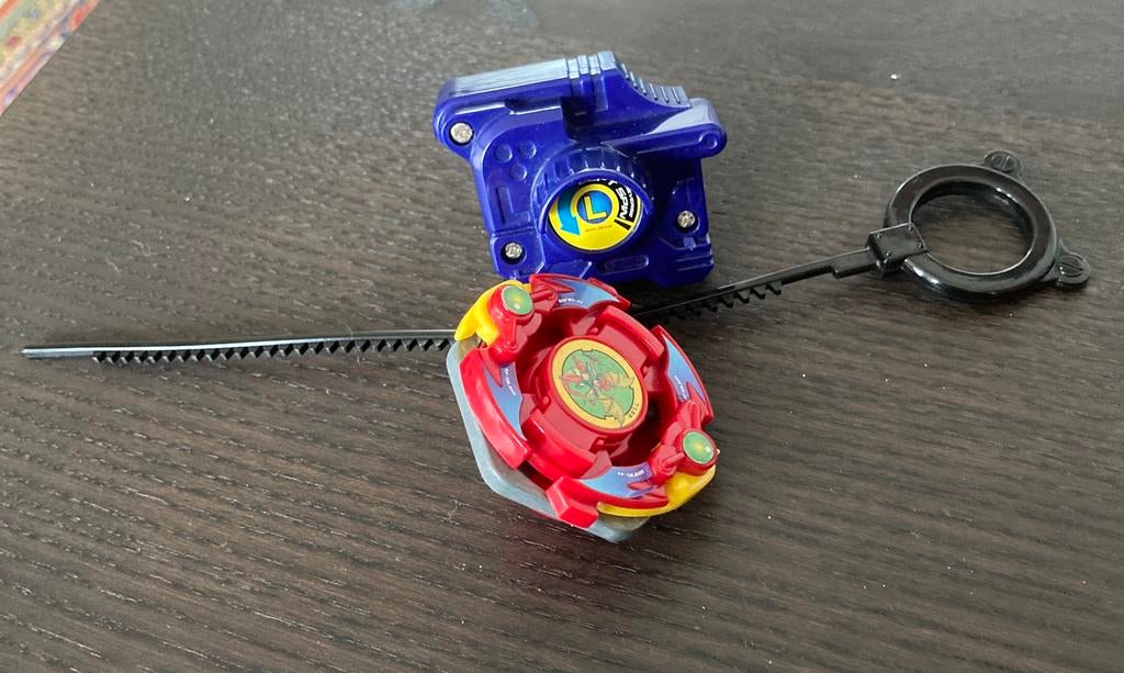 Beyblade Takara Wing Attacker plus launcher, Ophalen of Verzenden, Gebruikt