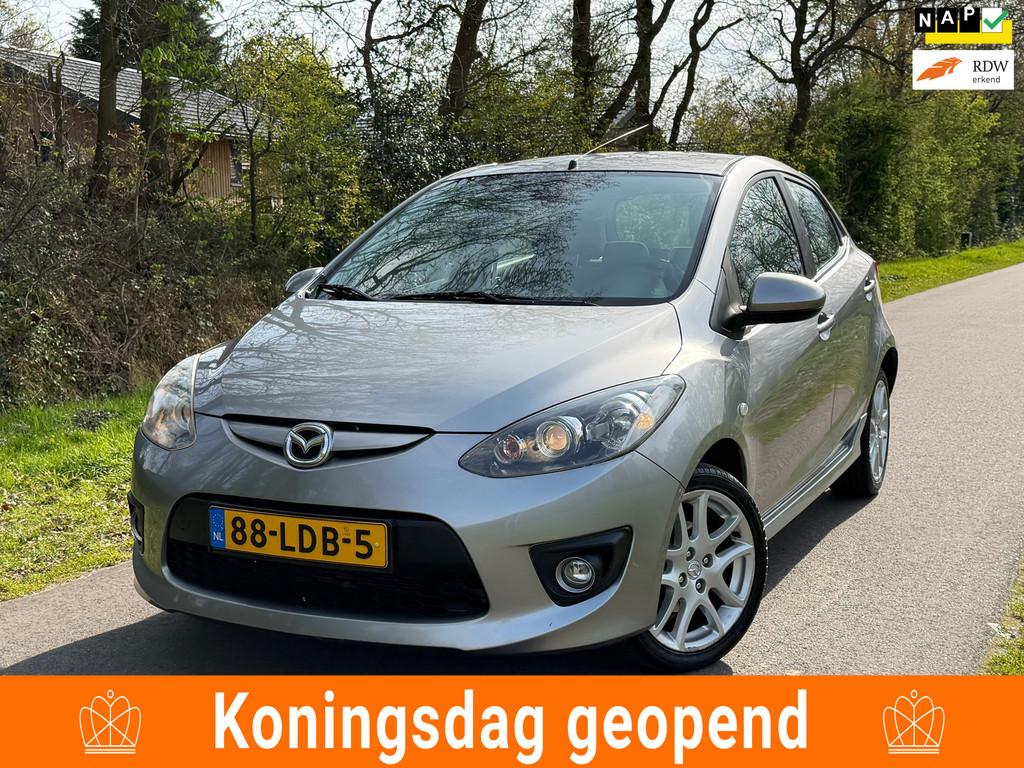 Mazda 2 1.5 GT-M | Cruise + Airco + Radio Nu € 4.975,-!, Voorwielaandrijving, Stof, 4 cilinders, 4 stoelen