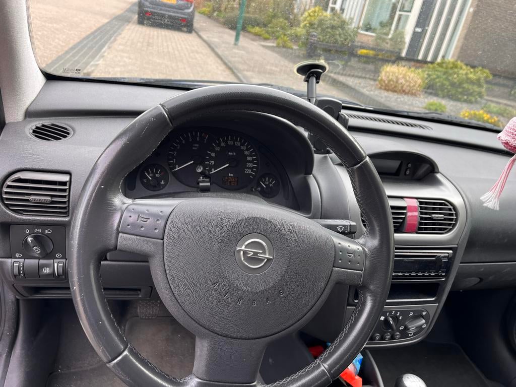 Opel Corsa 1.2 16V 3D 2004 Blauw, Auto's, Voorwielaandrijving, 450 kg, 74 pk, 31 €/maand