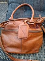 Cowboysbag leren tas, Ophalen