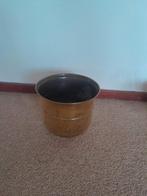 Koperen bloempot, Ophalen