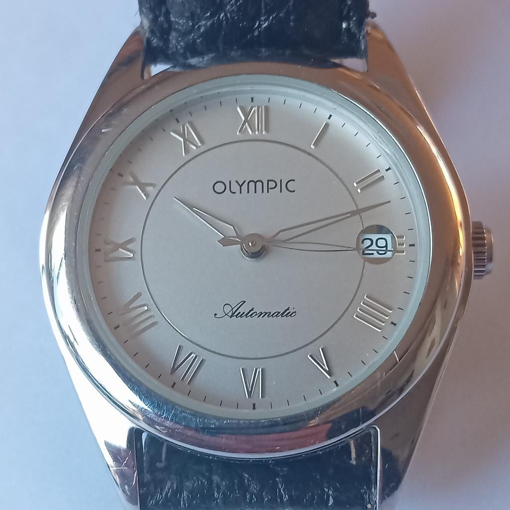 Olympic automaat in een zeer nette staat., Sieraden, Tassen en Uiterlijk, Horloges | Antiek, Ophalen of Verzenden, Staal, Overige merken