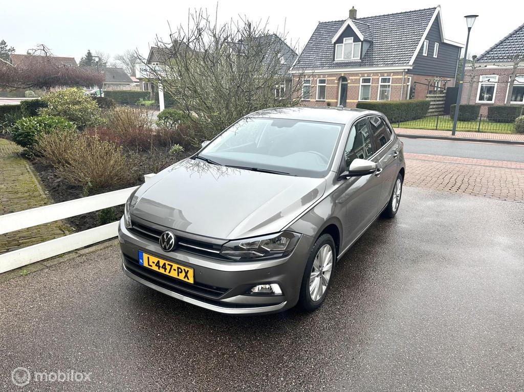 Volkswagen Polo 1.0 TSI Highline DSG AUTOMAAT FACELIFT MODEL, Stof, Gebruikt, Euro 6, Met garantie (alle)