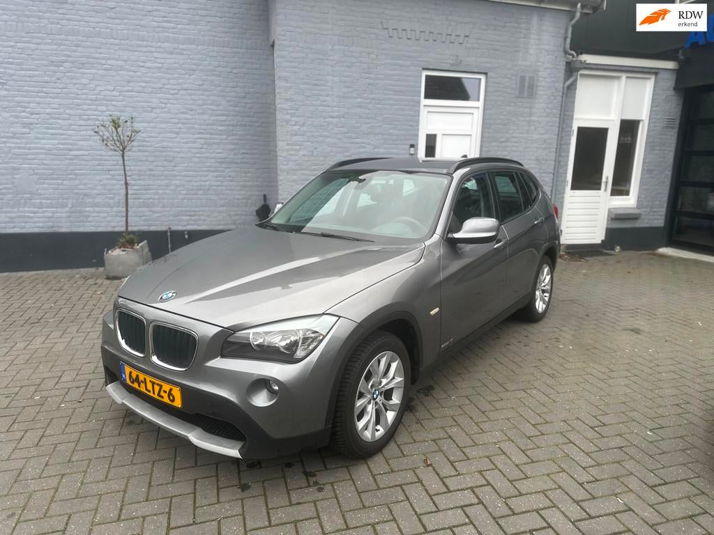 BMW X1 SDrive18i | NAVI | TREKHAAK | CLIMA |, X1, Euro 5, Zwart, 4 cilinders