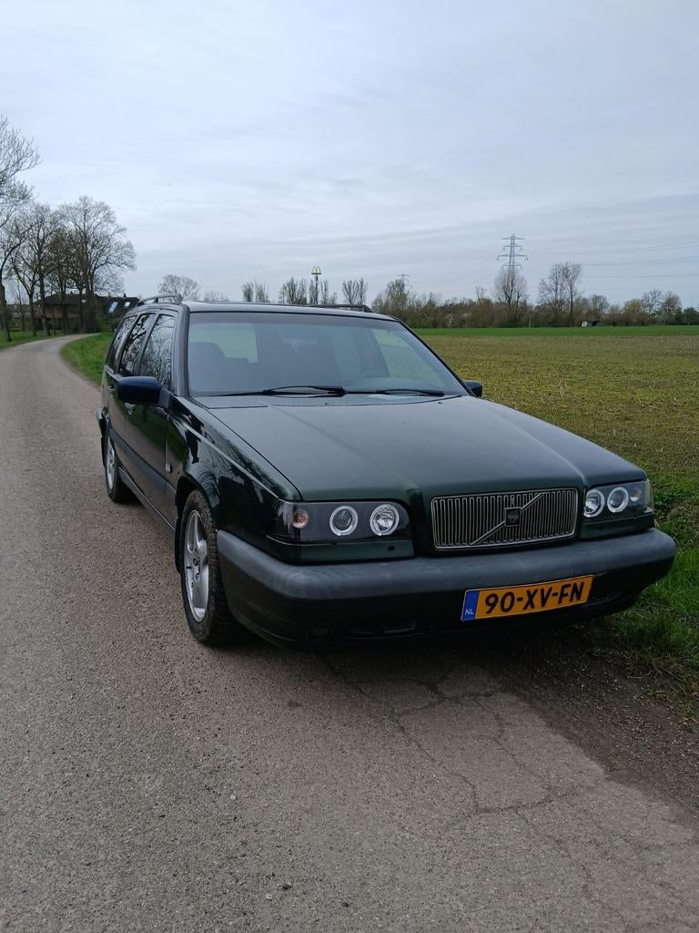 Volvo 850 2.3 T-5 AUT 1995 Blauw, Auto's, Blauw, Leder en Stof, Stationwagon, Particulier