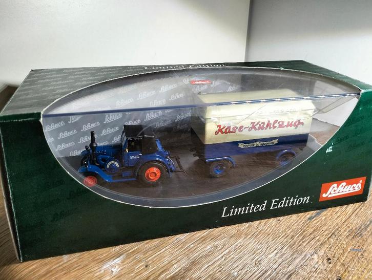 Te koop Schuco Lanz Eilbulldog met Kase-Kuhlzug  Aanhanger., Hobby en Vrije tijd, Modelauto's | 1:43, Zo goed als nieuw, Tractor of Landbouw