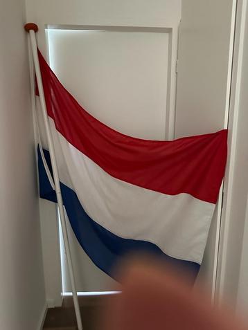 Nederlandse vlag met stok beschikbaar voor biedingen