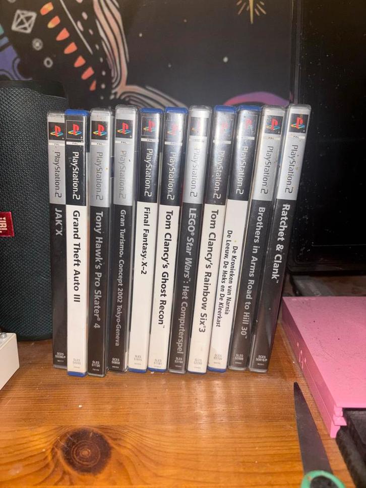 Roze Playstation 2 + Spellen, Spelcomputers en Games, Spelcomputers | Sony PlayStation 2, Gebruikt, Slim, Roze, Met 2 controllers