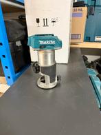 Makita bovenfrees DRT50 body in m-box, Doe-het-zelf en Verbouw, Gereedschap | Freesmachines, Ophalen of Verzenden, Zo goed als nieuw