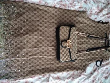 Gucci set dames  beschikbaar voor biedingen