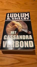 Robert Ludlum - Het Cassandra verbond, Boeken, Ophalen of Verzenden, Zo goed als nieuw, Robert Ludlum; P. Shelby