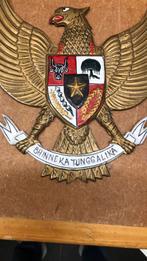 Metalen wapenschild Indonesië, Ophalen