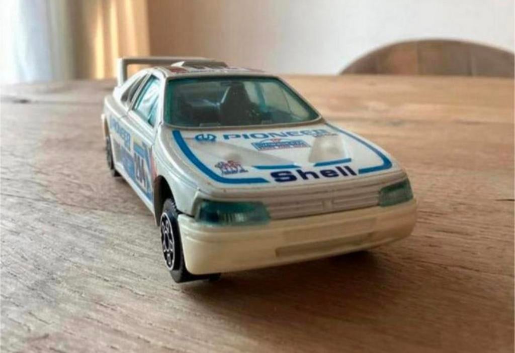 Peugeot 405 Rally Pioneer / Shell – Bburago 1:43, Hobby en Vrije tijd, Modelauto's | 1:43, Zo goed als nieuw, Auto, Overige merken