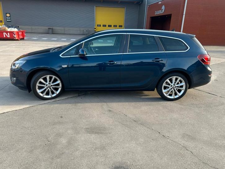 Opel Astra 1.4 Turbo 2012 Blauw - motorisch gereviseerd, Auto's, Opel, Particulier, Astra, ABS, Airbags, Airconditioning, Bluetooth