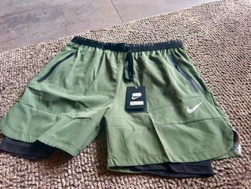 Nike hardloopbroek groen L met binnenbroek beschikbaar voor biedingen