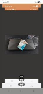 Afdekplaat voor vw autoradio rns 310  en rns 510, Ophalen