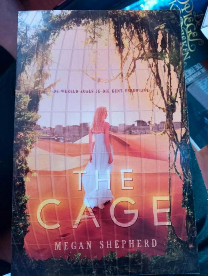 Megan shepherd the cage Nederlands, Boeken, Fantasy, Zo goed als nieuw, Ophalen of Verzenden