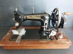 Mundlos naaimachine, Ophalen