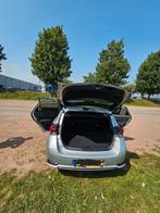 Toyota Auris 1.8 Hybrid 136pk CVT 2017 Grijs, Auto's, Stof, Zwart, 4 cilinders, 26 km/l