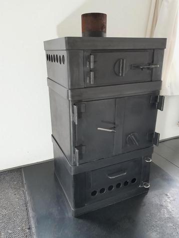 prachtige stoere houtkachel met comfortabele voorzieningen beschikbaar voor biedingen