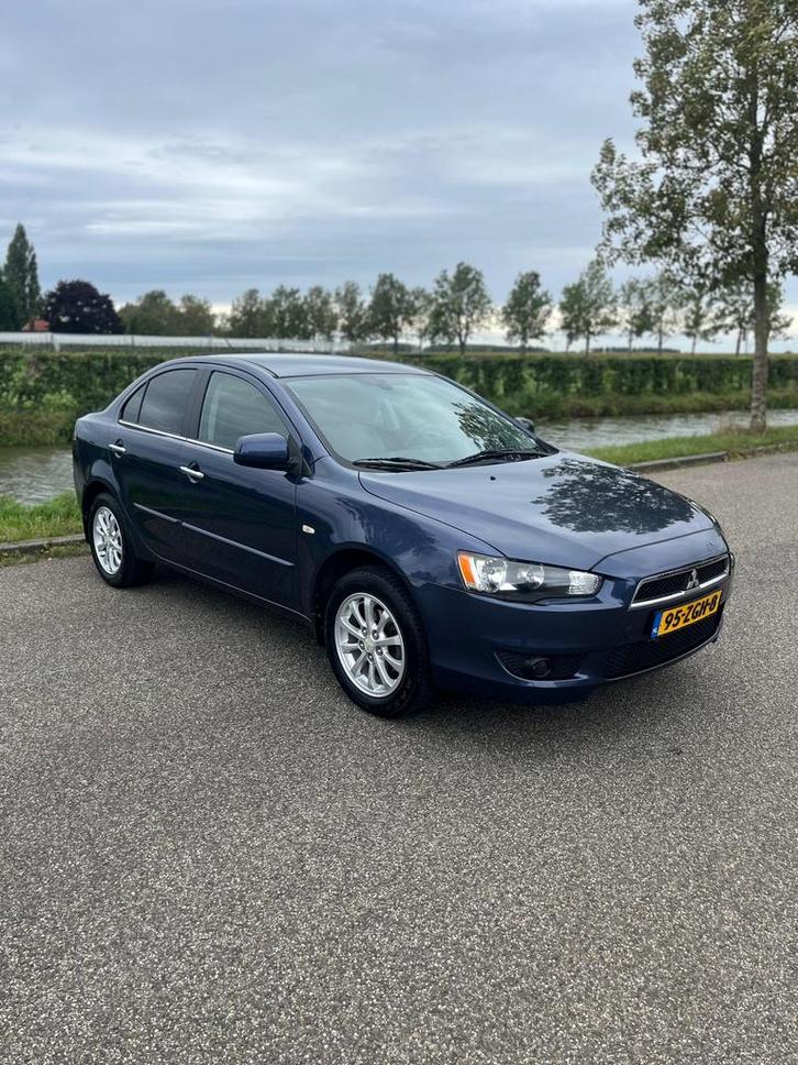 Mitsubishi Lancer 2012 Blauw. Zeer nette auto!, Auto's, Mitsubishi, Bedrijf, Lancer, ABS, Airbags, Airconditioning, Bluetooth