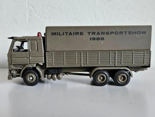 Tekno Scania 142 Leger Militaire Transportshow 1986 1:50, Hobby en Vrije tijd, Modelauto's | 1:50, Zo goed als nieuw, Bus of Vrachtwagen