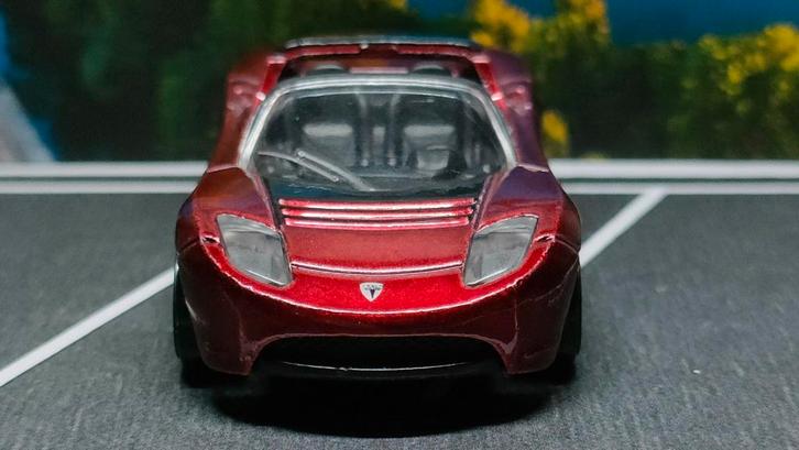 2008 Tesla Roadster bordeauxrood Hot Wheels, Hobby en Vrije tijd, Modelauto's | Overige schalen, Nieuw, Ophalen of Verzenden