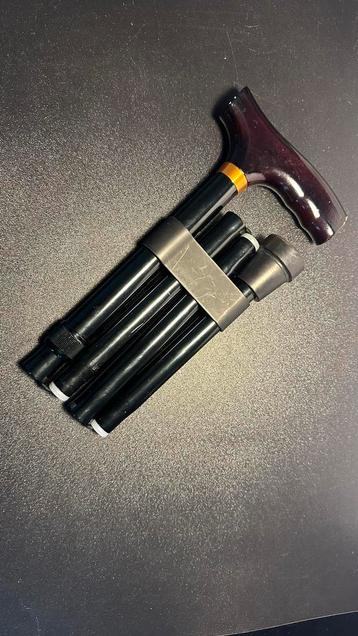 Handige verstelbare en opvouwbare wandelstok beschikbaar voor biedingen